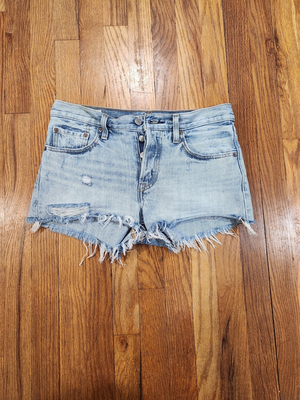 Levi's 501 Light Wash Blue Cut Off Shorts